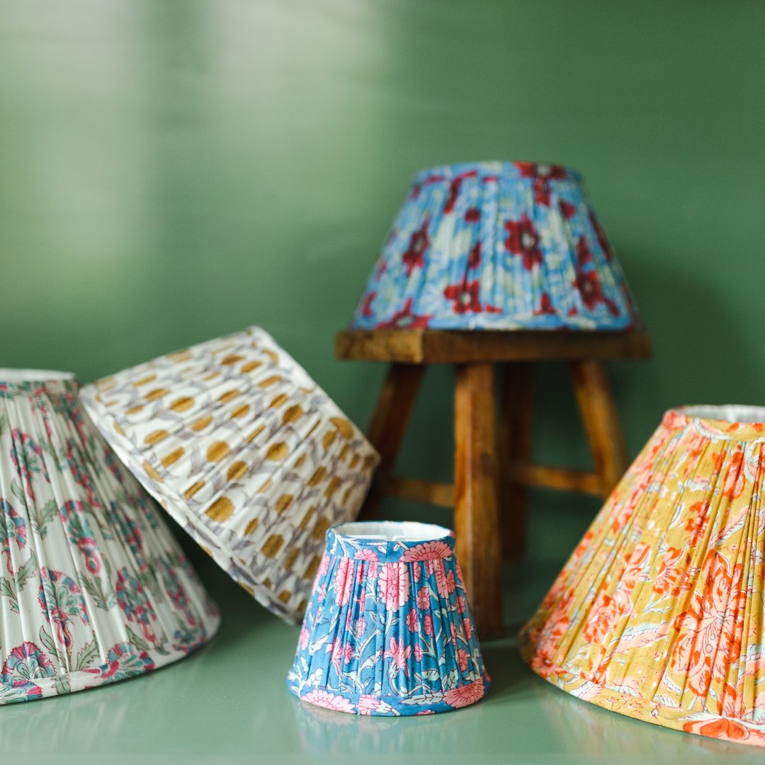 Organic cotton pleated lampshades in colorful block prints.