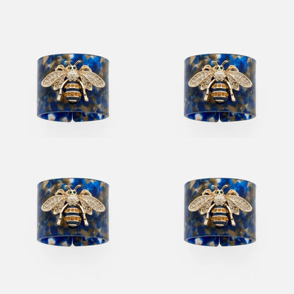 Stripey bee resin napkin rings, blue tortoiseshell, set of four