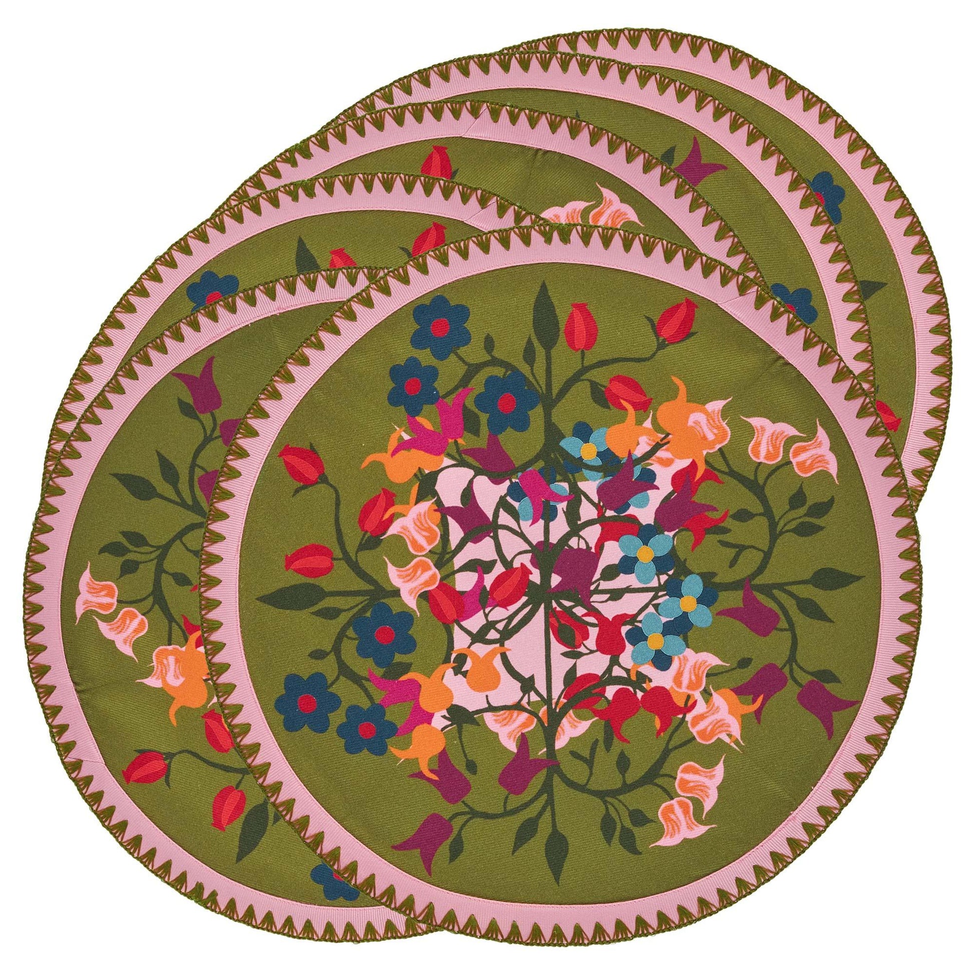 6 round placemats in green and pink floral motifs.