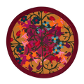 Round organic cotton placemat in orange and bordeaux floral geometric print.