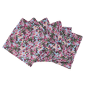 Whimsical cherry print on light blue organic cotton napkins.