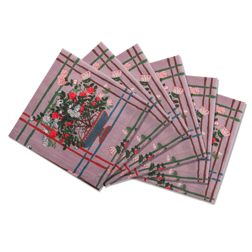Set of decorative napkins with purple floral patterns 