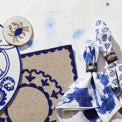 Stripey bee resin napkin rings, blue tortoiseshell, set of four