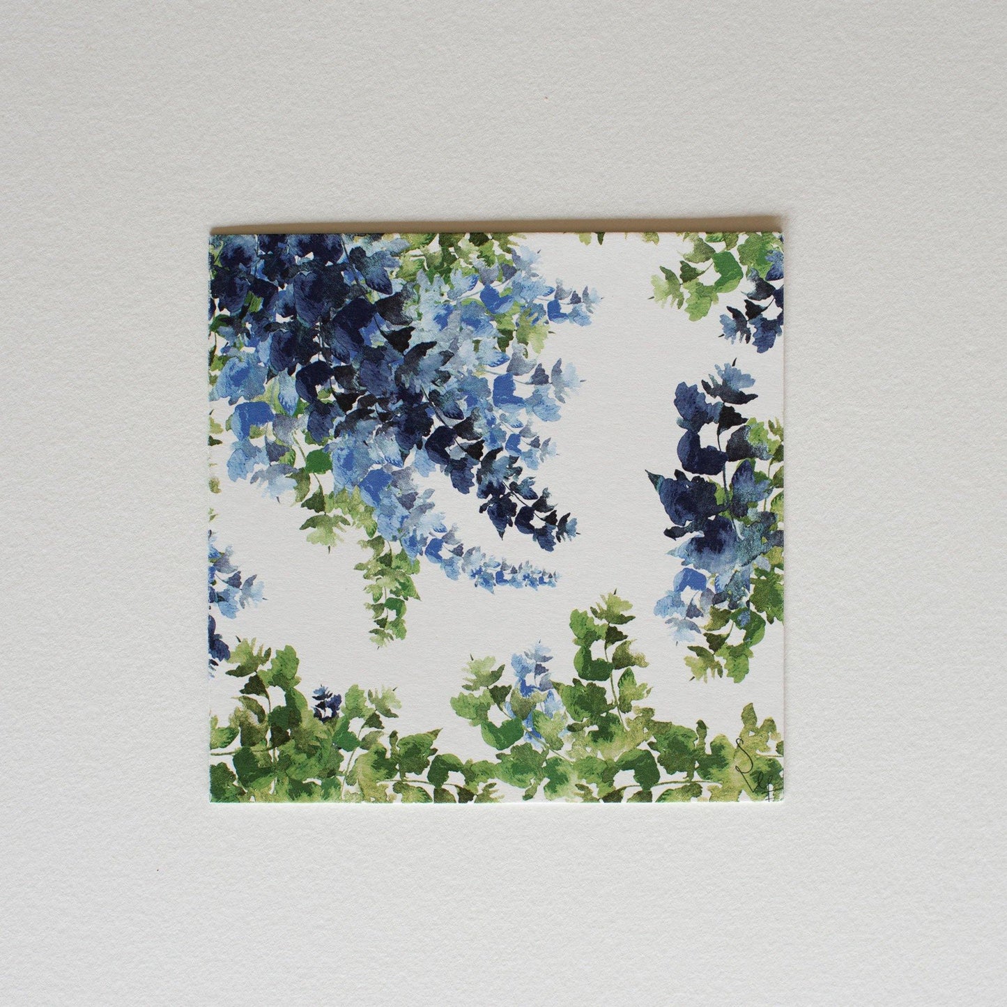 Green and blue floral illustrated card Wisteria Lane.