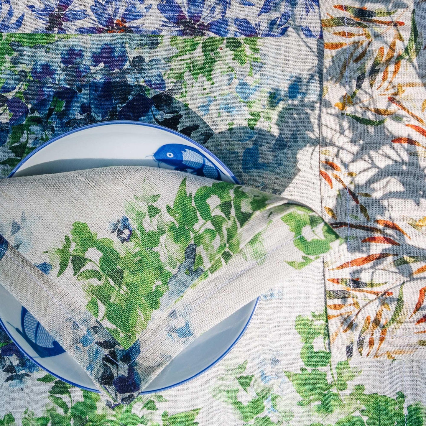 Close up of placemat and napkin made of organic linen and printed with low impact dyes.